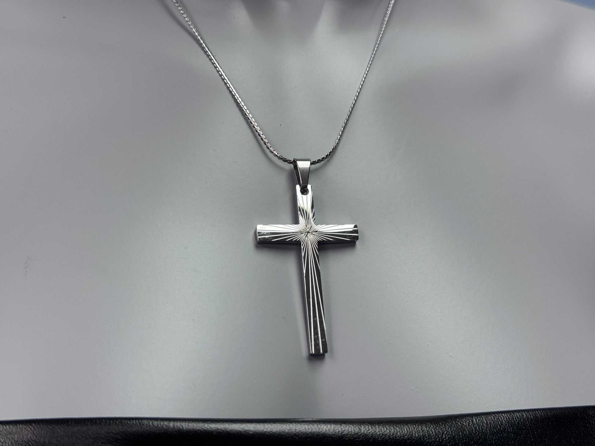 Unisex Christian cross necklace styled for men and women
